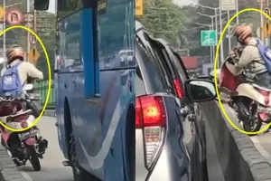 Bantu angkat motor dari separator busway, nasib pria ini apes banget
