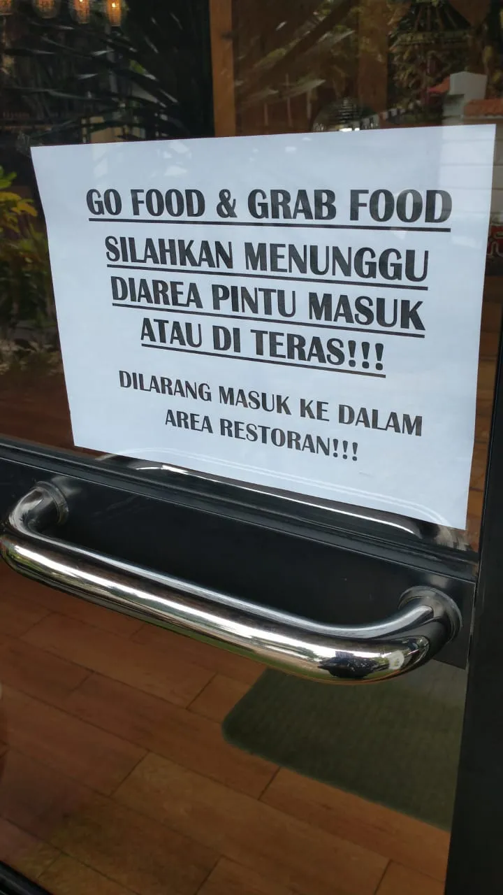 larangan resto driver masuk © Twitter/@GojekOnTwitt larangan resto driver masuk © Twitter/@GojekOnTwitt