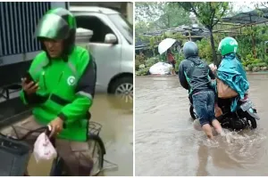 5 Potret tetap semangat bekerja di tengah banjir Jakarta, bikin salut