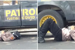 Viral polwan jaga kantor Bawaslu sambil gendong anak yang tertidur