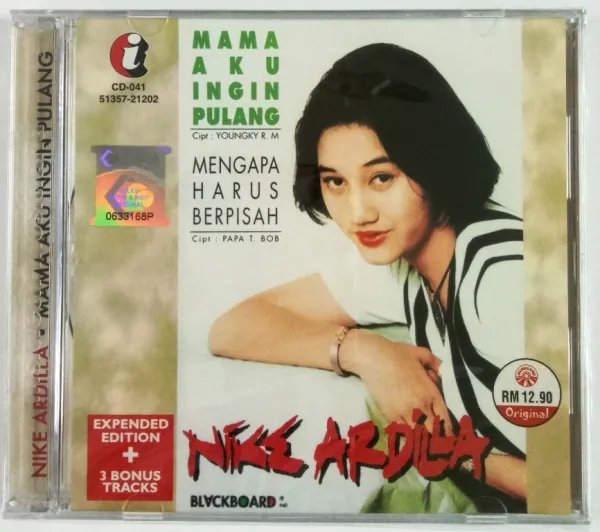 gaya Nike Ardilla di cover album era 90-an dari berbagai sumber