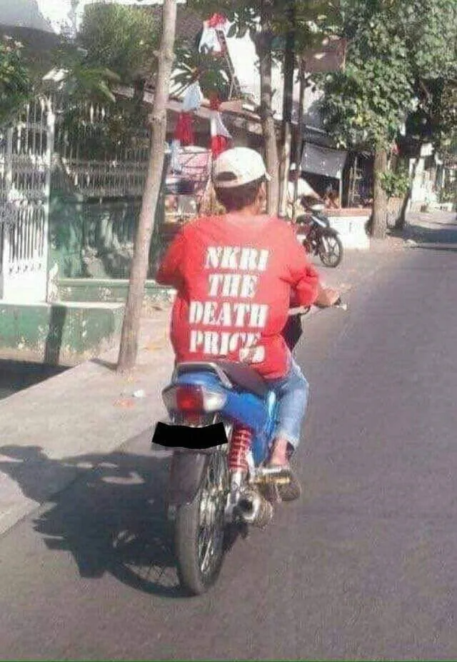 tulisan kocak di baju bapak bapak © berbagai sumber