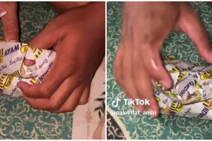 Pria ini pesan burger pakai layanan antar makanan, pas datang dapat bonus yang bikin geleng kepala
