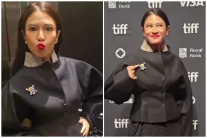 9 Potret Dian Sastro hadiri Toronto Film Festival 2025, tampil berani pakai pin One Piece