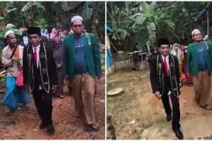 Tetangga kampung rayakan gelar profesi guru pria ini, warga berbaris mengiringi sepanjang jalan desa
